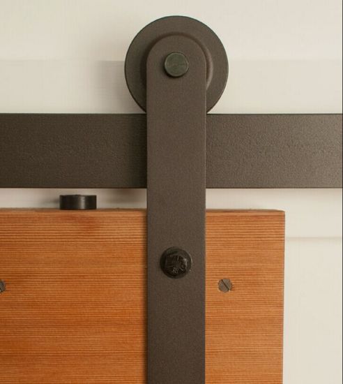 Herrajes de rodillos de hierro fundido para puertas de granero corredizas