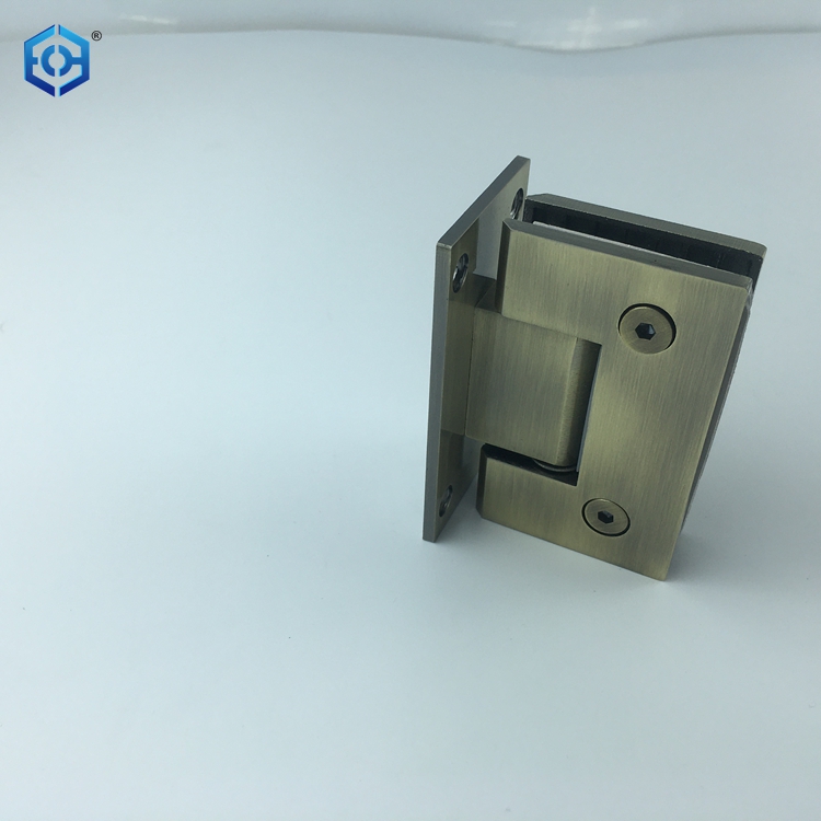 Reparaci&oacute;n de la bisagra de la puerta de la ducha de cristal sin marco