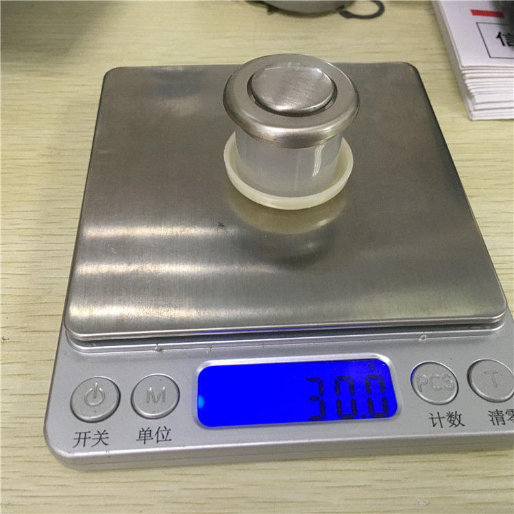 peso de la perilla de la puerta