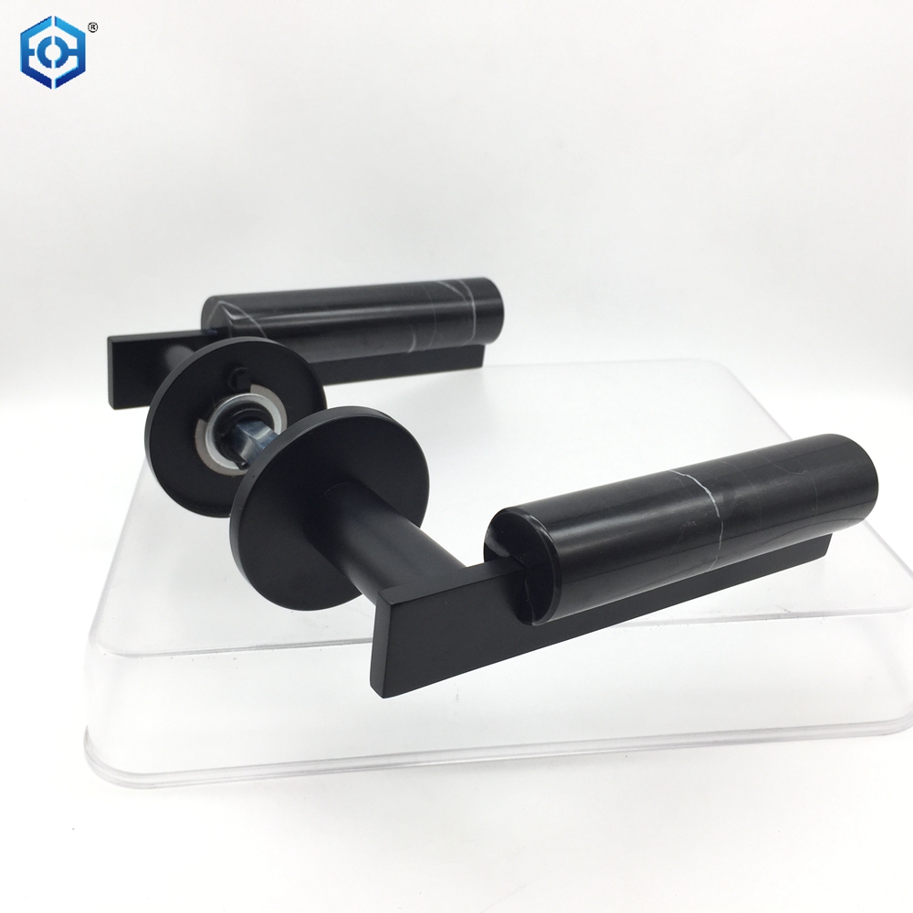 Manija de palanca de puerta de mármol de acero inoxidable negro con rosa redonda
