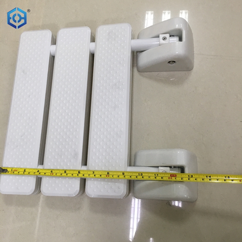 asiento de ducha montado en la pared